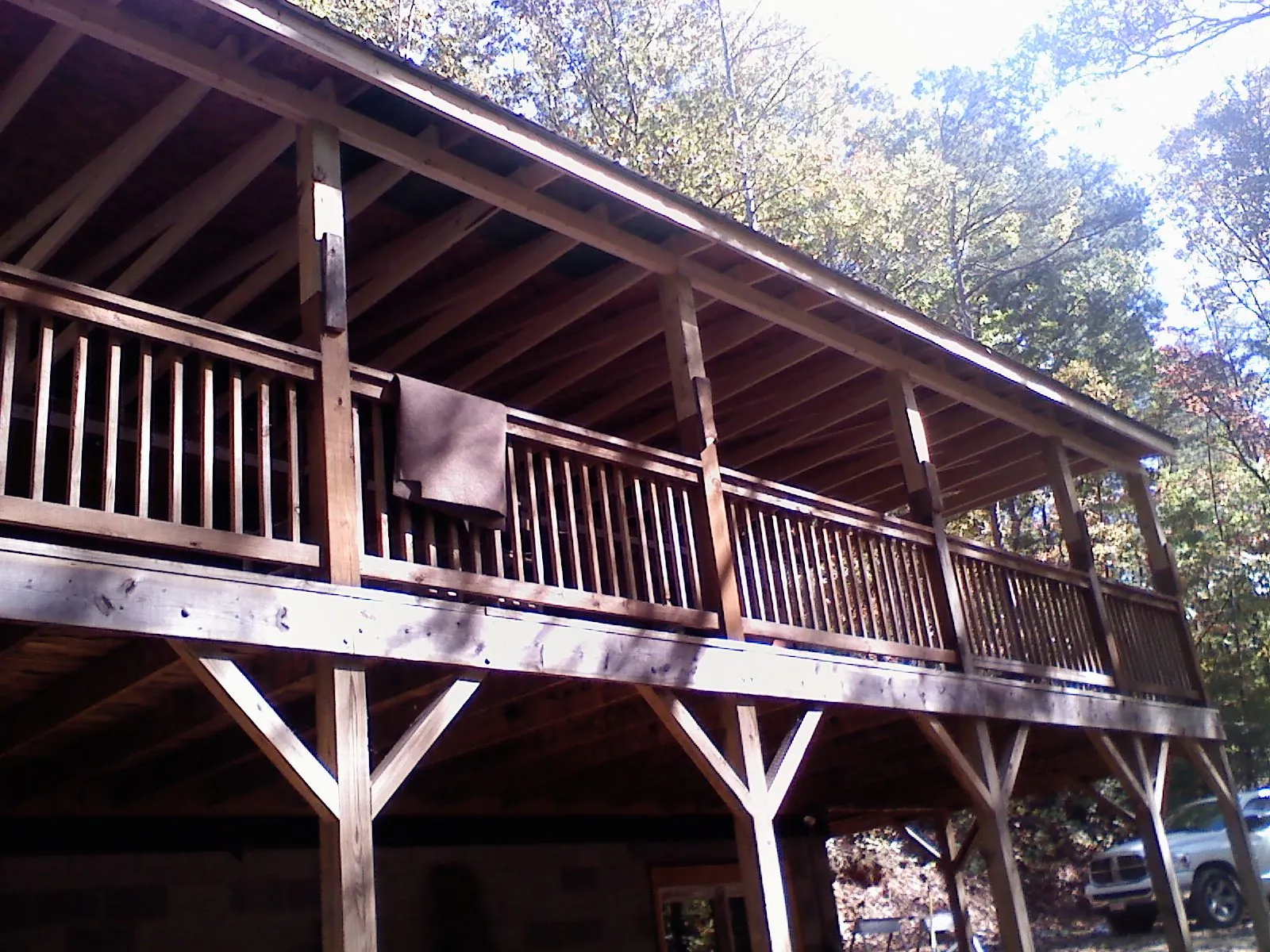 Timber framing under a new elevated porch and deck — Roof Leak Repair in Americus by Roofing Brothers